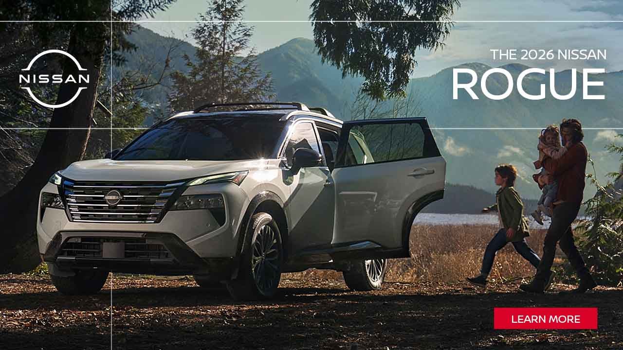 2026 Nissan Rogue with family in mountain setting