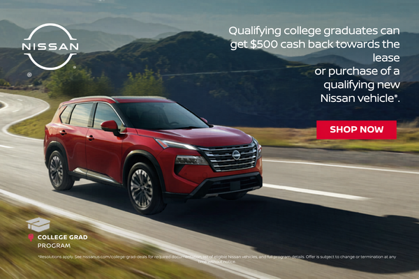 Red Nissan SUV driving on scenic road with college grad $500